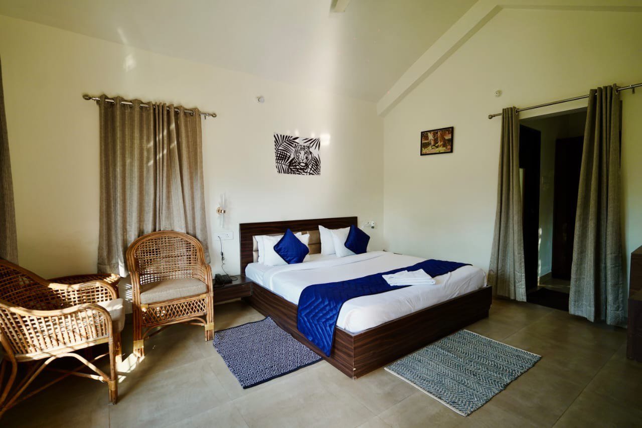 Comfortable room with jungle art at Footprint Resort